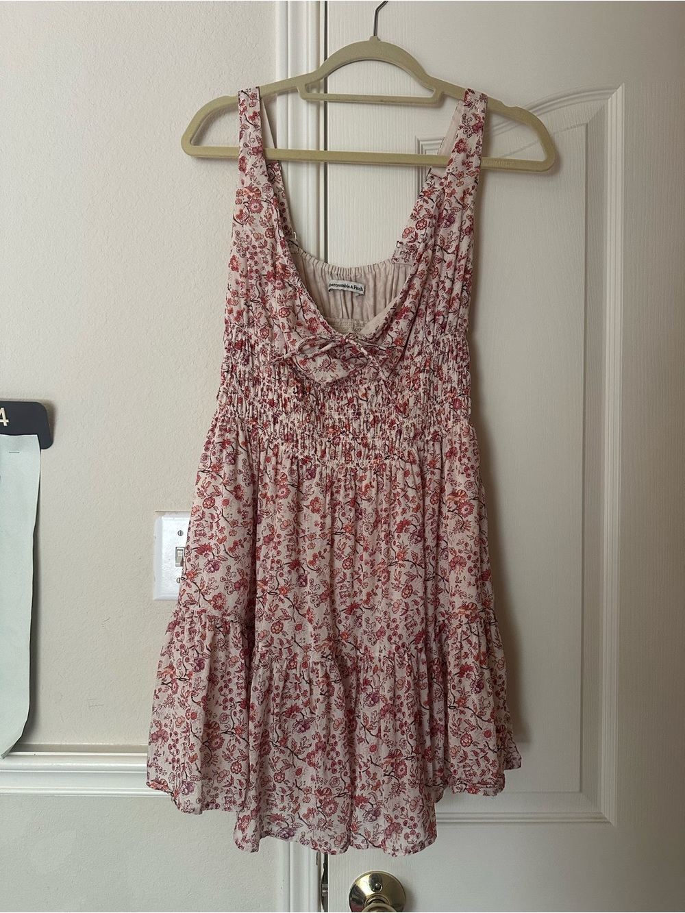 Smocked tie- front mini dress